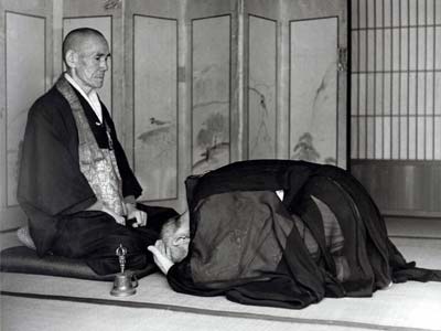 Philip Kapleau prostrating to his teacher, Yasutani Roshi